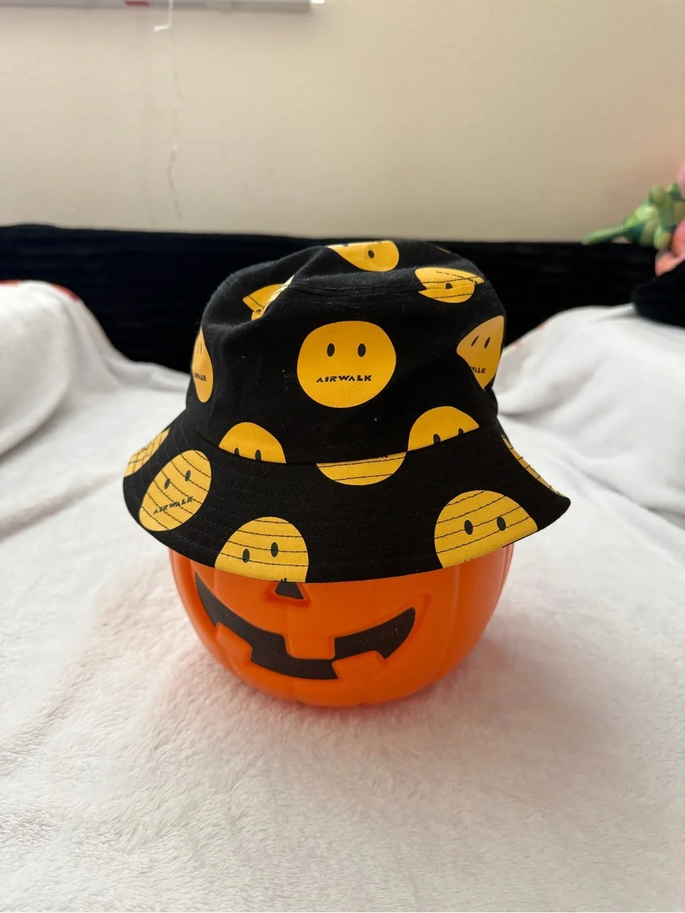 Airwalk Black Bucket Hat with Yellow Smiley Pattern